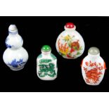 Three modern Chinese milk glass snuff bottles, enamelled with a dog of fo, peony and pomegranates;