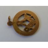 A 9ct gold Masonic pendant circa 1920; and a Masonic gold stickpin (2)