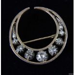 An antique rose cut diamond crescent brooch, c1880, mounted in silver and gold