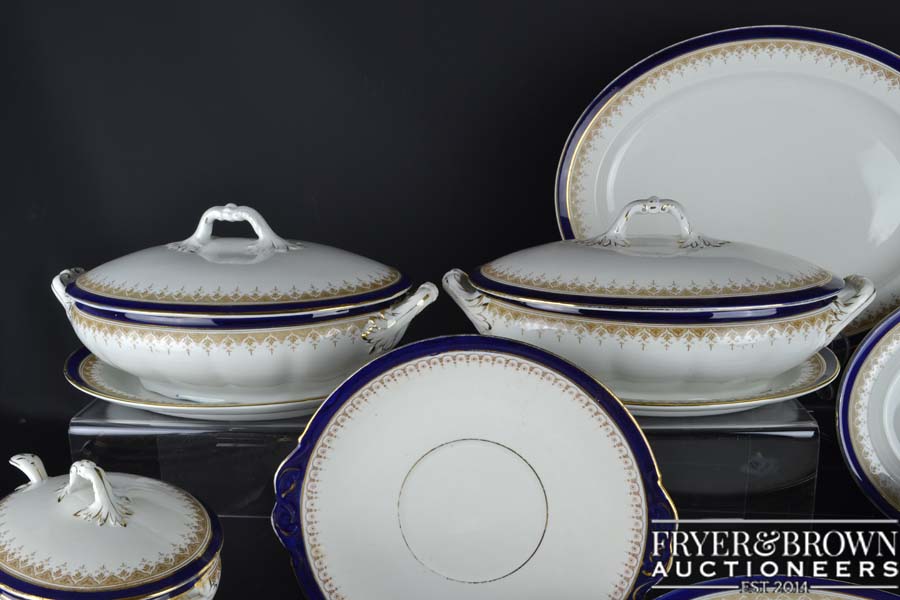 A Victorian English earthenware dinner service, white with blue and gold banding to edge, comprising - Image 2 of 2