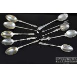 Nine various silver teaspoons, including Nelson's column; a golf trophy spoon; and a coronation