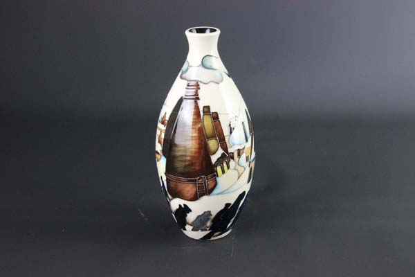 Paul Hilditch for Moorcroft Pottery, a Moorcroft collectors club vase,, decorated in 'chimneys in