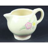 A Clarice Cliff Pottery small jug,c1936, printed with Matana pattern, the moulded jig printed with