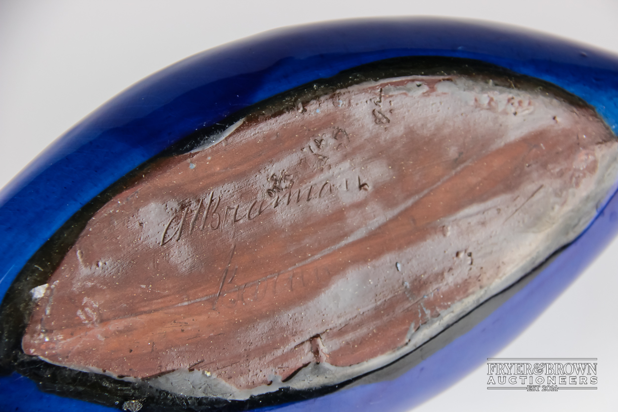 A C.H Brannam pottery model of a canoe, glazed in blue, incised mark, 29cm max approx - Image 2 of 2