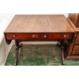 A George III mahogany rosewood, ebony and boxwood sofa table, c1805, the mahogany table and drop