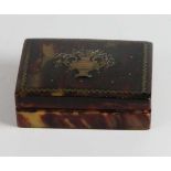 A tortoiseshell pique work box, the hinged cover inlaid in yellow metal with silver wire work,
