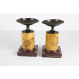 A pair of antique grand tour style bronze and marble tazza, the bronze tazza with plain gadroon