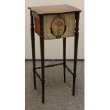 A Edwardian table work box, on tapered legs with bobbin turned stretchers, the shaped rectangular