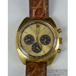 Movado - A 1970's gentlemans 18ct yellow gold and black enamel Datron HS360, the circular gilt