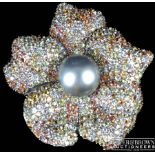 An impressive southsea cultured pearl, diamond, coloured diamond and multi coloured sapphire
