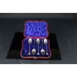 Five silver coffee spoons, scroll pattern, London 1896, makers mark of William Hutton & Sons, in