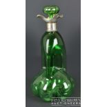 A silver mounted Stevens & Williams glass decanter, green cased over clear, of lobed triform body,