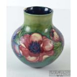 A Moorcroft Anemone pattern vase, globular with short cylindrical neck, impressed mark and green