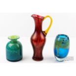 Two Mdina glass vases, one ovoid, the other of money bag form, blue, green and yellow colouration;