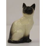 A Beswick pottery figure of a Siamese cat, 10cm