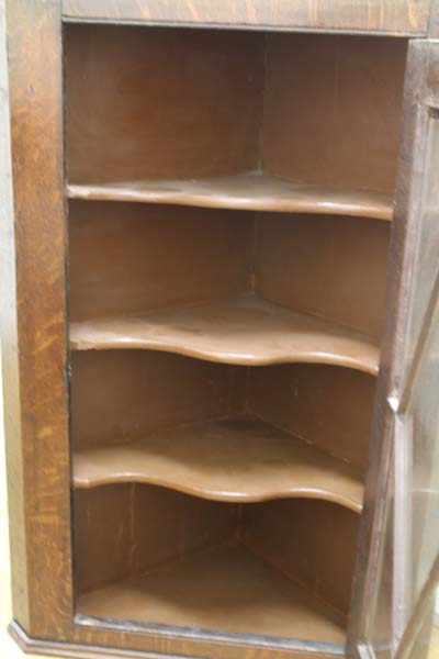 An early 20th Century oak hanging corner cupboard with astral glazed door opening onto 3 fixed - Image 3 of 4