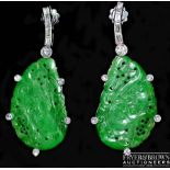 A fine and attractive pair of vintage Chinese jadeite and diamond earrings, the bright apple green