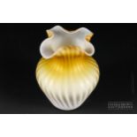 A Stourbridge air trap satin glass vase, of money bag form, with wavy quatrefoil rim, yellow gold