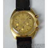 Omega Seamaster - A 1970's gentleman's 18ct yellow gold chronograph wrist watch, the gold dial