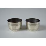 A small pair of novelty Victorian barrel shaped silver salts, with engraved faux wood barrel