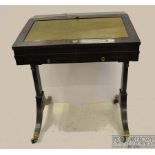 Julia Emily Gordon's small George III ebony veneer artists desk, c1805, the ebony veneered top