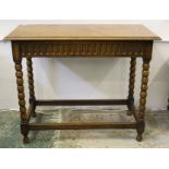 An early 20thC oak side table with single drawer on bobbin turned legs, 92 x 45.5 x 74cm with