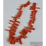 A late Victorian natural orange coral fringe necklace c1890, 36cm long