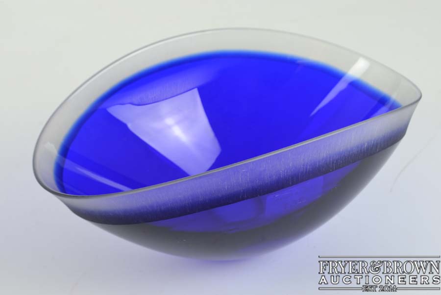 Neil Wilkin - A cobalt blue case elliptical glass bowl, the rim and base cut back to colourless