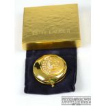 Estee Lauder - Collectable compact, Gemini, decorated with a reserve of two female heads on a moon b