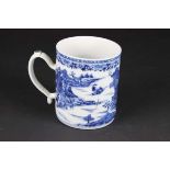 A Chinese export porcelain mug or tankard, painted in blue with pagodas and boats in a river