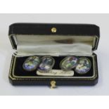 Golfing interest - A pair of 925 stamped silver and enamel golfing cufflinks, each with polychrome