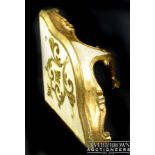 A small Venetian style painted and gilded corner bracket, decorated with scraffitto designs of