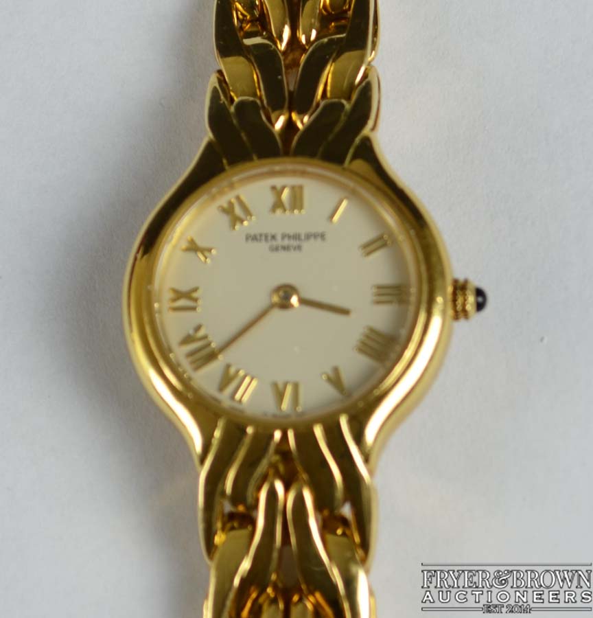 Patek Philippe 'La Flamme' - An 18ct yellow gold ladies bracelet wrist watch in near mint condition,
