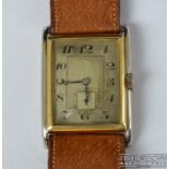 Vintage Marc Favre - A 1940's bi-coloured gold gentleman's wrist watch, the large rectangular