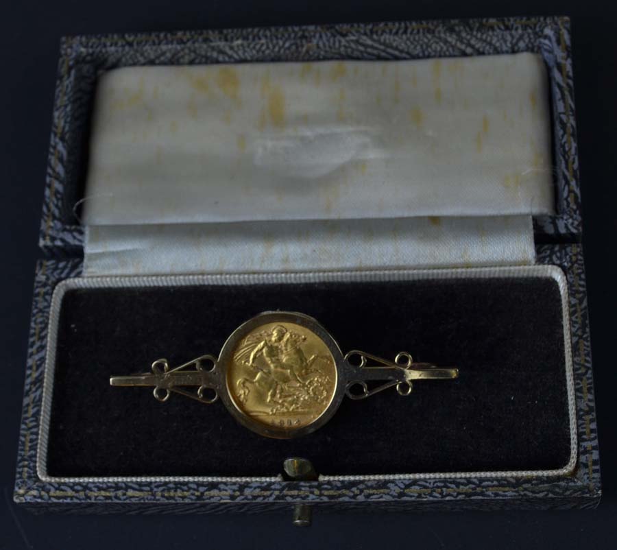 A half sovereign dated 1912, mounted as a bar brooch, 7grs approx.