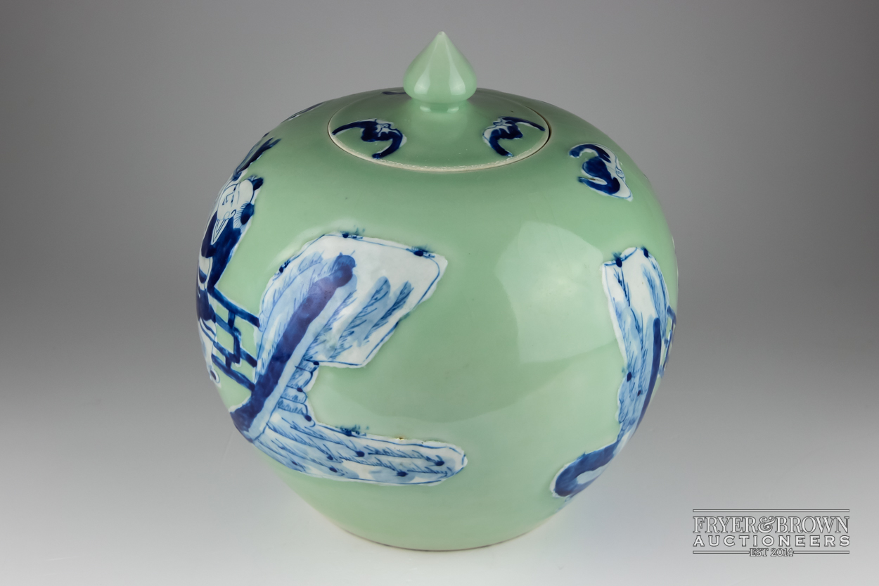 A Chinese porcelain celadon ground blue and white jar and cover, globular decorated with figures, - Image 2 of 5
