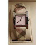A ladies Burberry wrist watch, model no.BU4311, with original box and papers