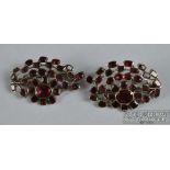 A pretty pair of mid 18thC garnet cluster brooches, each of flower spray design and mounted in