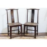 Two large Chinese carved wooden scholar chairs