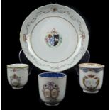 A Chinese export armorial porcelain deep dish, central shield form cartouche, the husk garland