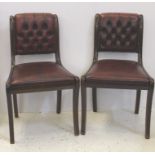 A set of four dining chairs, with burgundy leather seats in Chesterfield style, buttoned backs, with