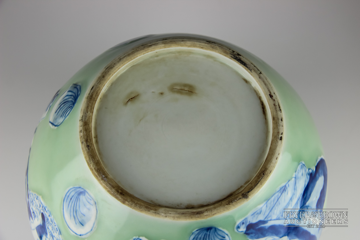 A Chinese porcelain celadon ground blue and white jar and cover, globular decorated with figures, - Image 5 of 5