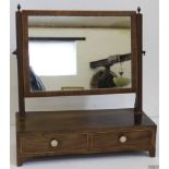 A mahogany toilet mirror, the rectangular swing plate over two drawers with boxwood stringing to