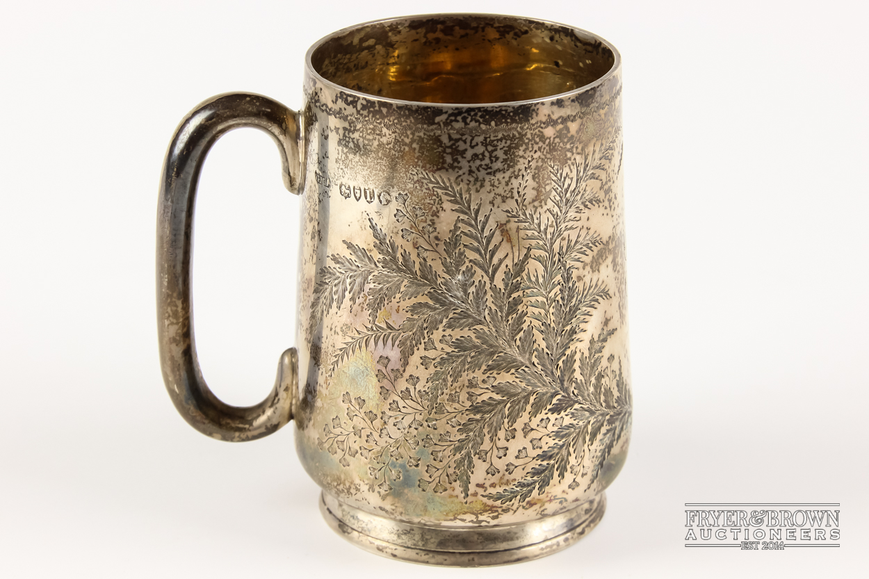 A small or child's Victorian silver tankard or christening mug, of tapered cylindrical form on