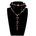 An attractive Art Deco banded agate, coral and crystal necklace, composed of eight graduated