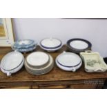 Five Booths soup plates, blue edged with gold rims; 13 plates by Falstaff; and a quantity of tureens