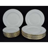 A Royal Albert Val D'or pattern part dinner service comprises ten dinner plates and ten side plates,