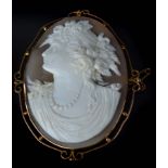 An antique shell cameo gold mounted brooch, c1890, the cameo well carved with the profile of a