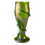 A Bohemian iridescent glass snake vase of large size, the dimpled bud form on spreading foot trailed