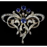 A French belle époque sapphire and diamond pendant brooch, c1905, of stylised scroll design set to